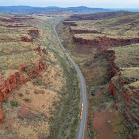 6616ab8ed8c3c268632d0a1d_a-road-through-a-canyon-in-australia_1768021114151.jpg
