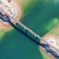 6616ab8ed8c3c268632d0a1d_train-track-over-an-inlet-at-port-augusta-in-south-australia_1768025913275.jpg