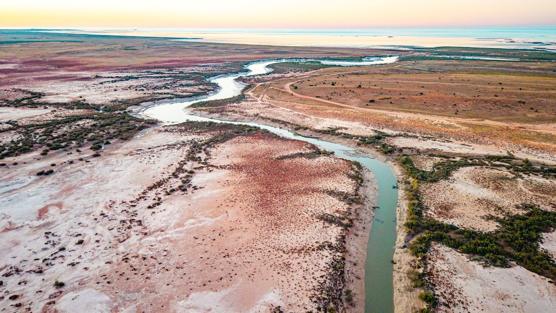 6616ab8ed8c3c268632d0a1d_aerial-landscape-of-tidal-flats-of-east-pilbara-western-australia_1768033067553.jpg