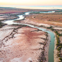 6616ab8ed8c3c268632d0a1d_aerial-landscape-of-tidal-flats-of-east-pilbara-western-australia_1768033067553.jpg