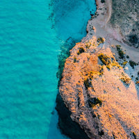 6616ab8ed8c3c268632d0a1d_coral-bay-coastline-_1776398021225.jpg