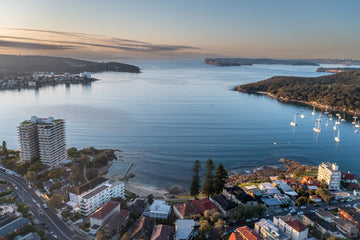 6616ab8ed8c3c268632d0a1d_fairlight-beach-from-above_1757989200676.jpg