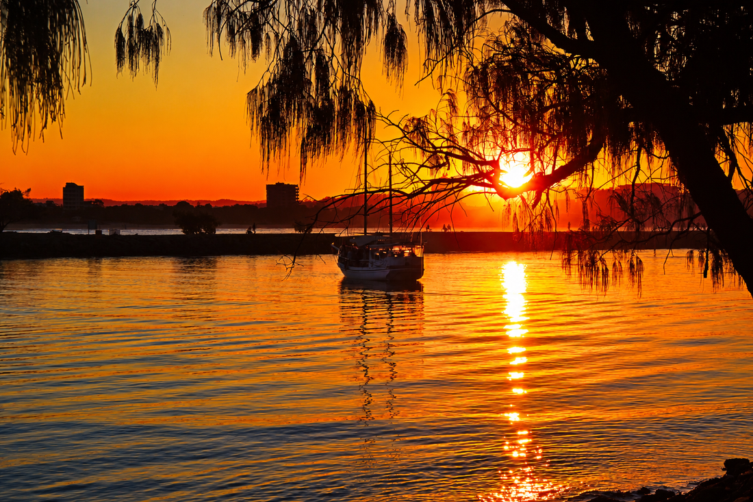 6616ab8ed8c3c268632d0a1d_golden-harbour-sunset_1791283686189.png