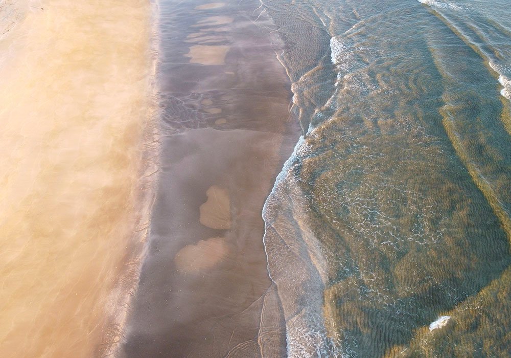 6616ab8ed8c3c268632d0a1d_hot-water-beach-iii_1770723226530.jpg