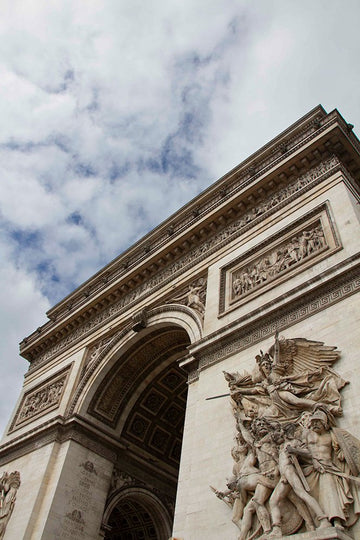 6616ab8ed8c3c268632d0a1d_klein-arc-de-triomphe-sculpture-and-sky_1763991272610.jpg