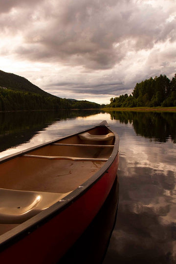 6616ab8ed8c3c268632d0a1d_klein-canoe-on-mirror-like-lake-at-dusk_1764152276348.jpg
