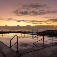 6616ab8ed8c3c268632d0a1d_sunrise-at-bellambi-rock-pools-1_1777544984687.jpg