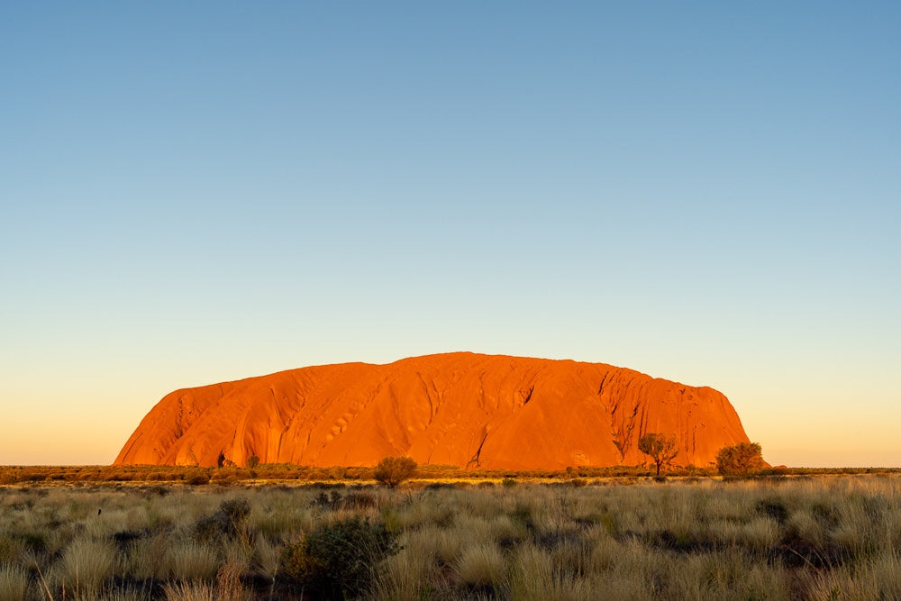 6616ab8ed8c3c268632d0a1d_uluru-sunset_1773787707193.jpg