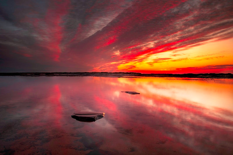 Mirrored sunrise at Narrabeen headland