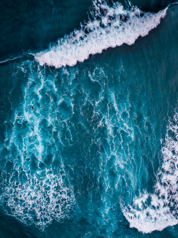 Surfer in Ruapuke, New Zealand