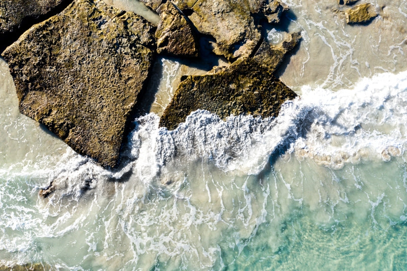 Wave crashing on rocks