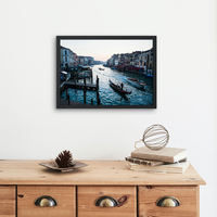 Sunset in Venice featuring a strem of boats and gondola