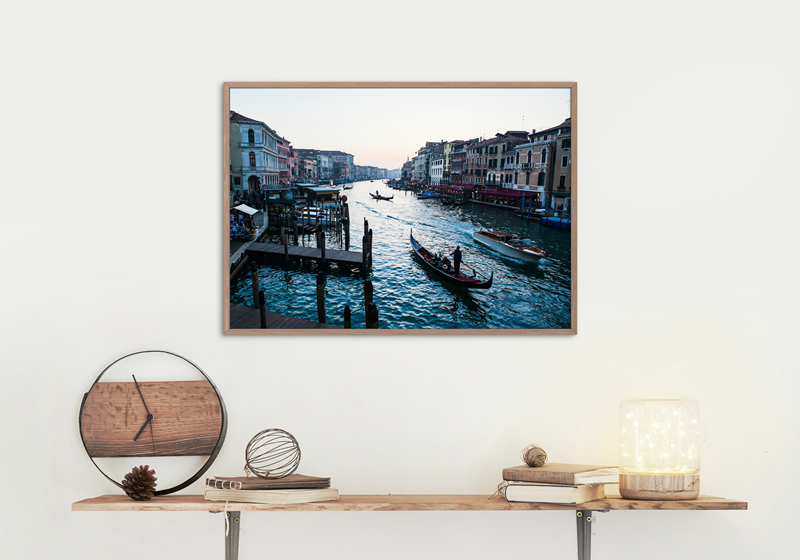 Sunset in Venice featuring a strem of boats and gondola