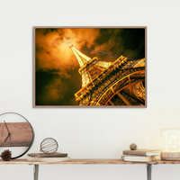 Eiffel Tower with it's beaming lights at night in Paris