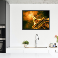 Eiffel Tower with it's beaming lights at night in Paris