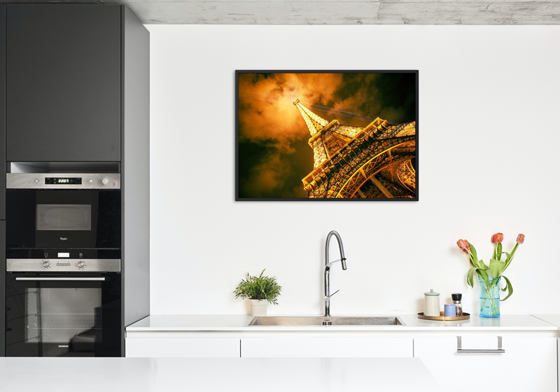 Eiffel Tower with it's beaming lights at night in Paris
