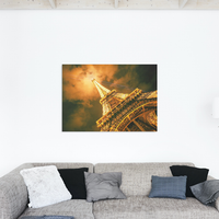 Eiffel Tower with it's beaming lights at night in Paris